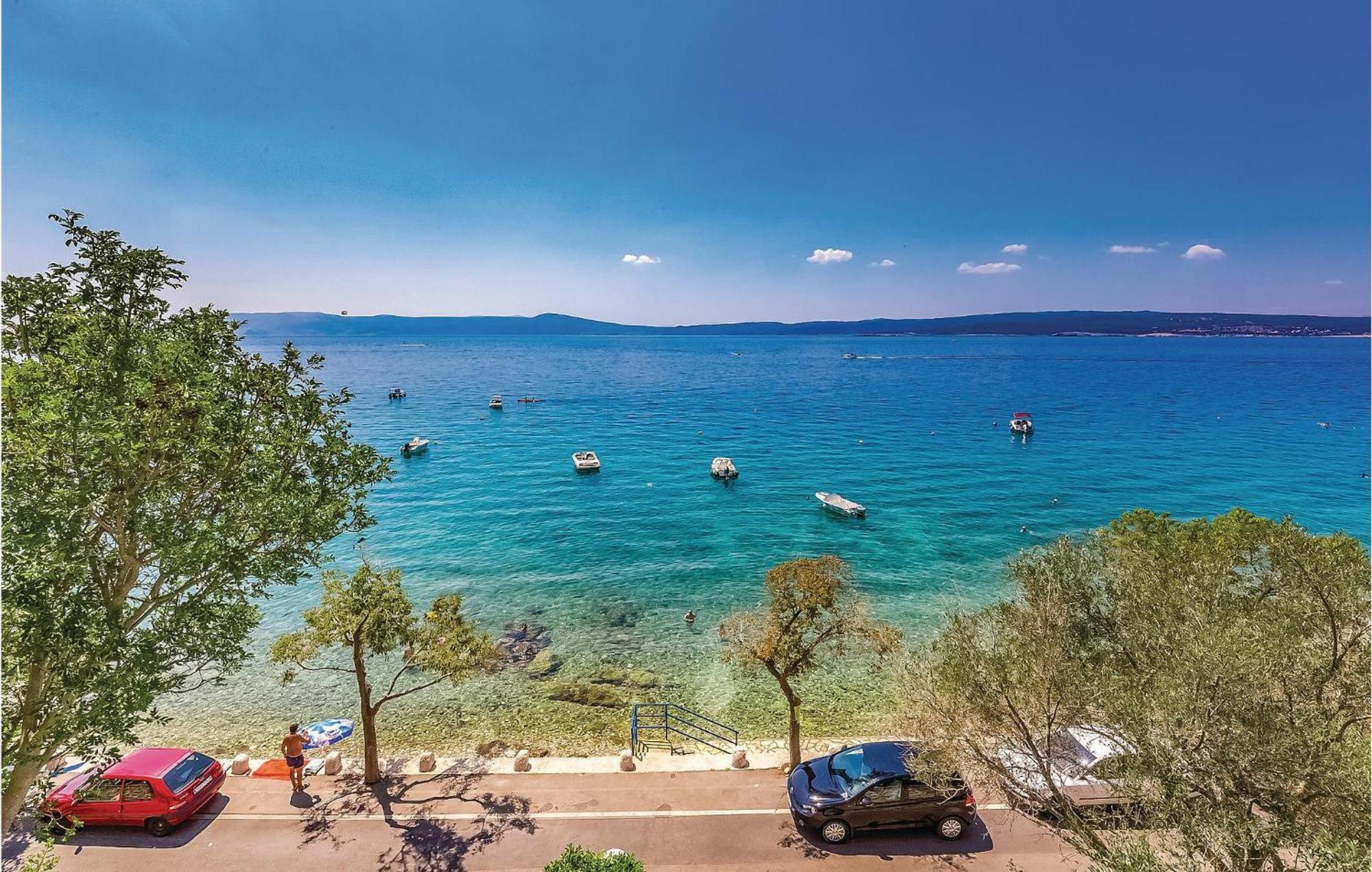 Lovely Apartment In Selce With House Sea View Екстериор снимка